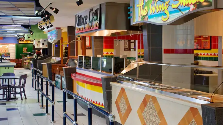 Village Grill and other express service restaurants in a Food Court
