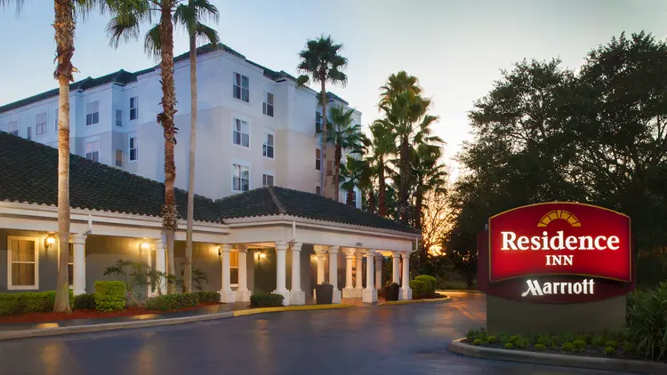 The outside entrance of Residence Inn at dusk