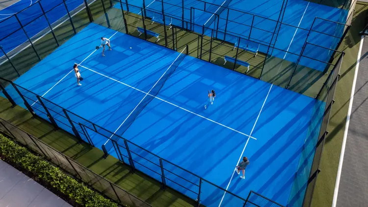 A sports area with courts designed for a variety of net sports and basketball at Caribe Royale Orlando, WorldHotels Elite
